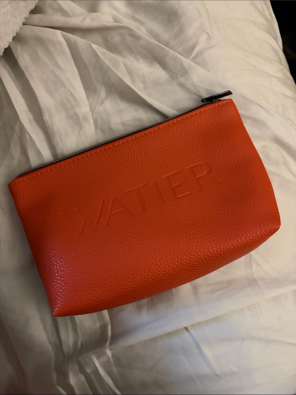 2/$20 Embossed 'WATIER' Orange Leather Zip Pouch